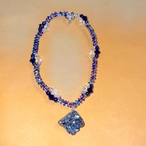 Purple crystal with galactic beads, chrome black beads and clear beads